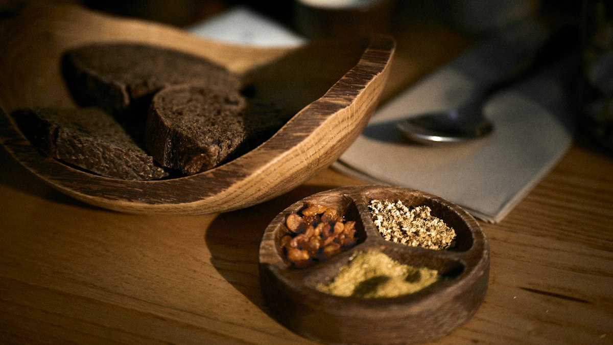 Ciabatta served alongside a bowl of olive oil for dipping